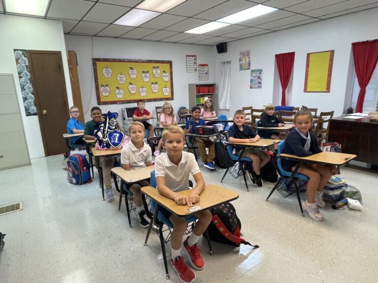 Elementary school kids in Christian school classroom