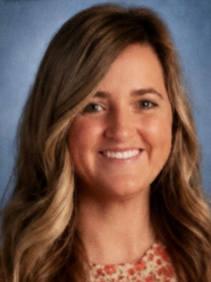 Portrait of Jessica Adkins, a smiling woman with blonde hair.